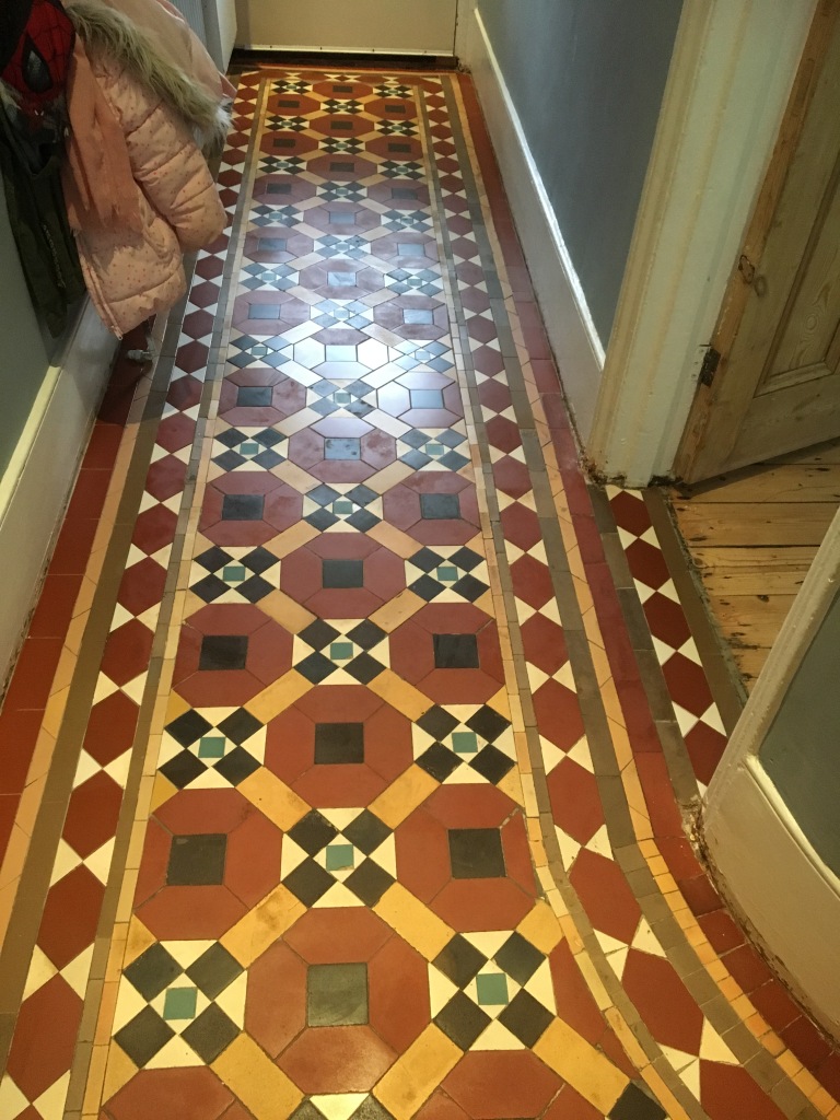 the same Victorian tiled hallway from the pic above completely restored and cleaned